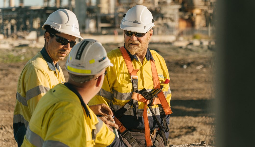 Staff discussing about the decommissioning of the Bulwer Island Refinery Gantry site